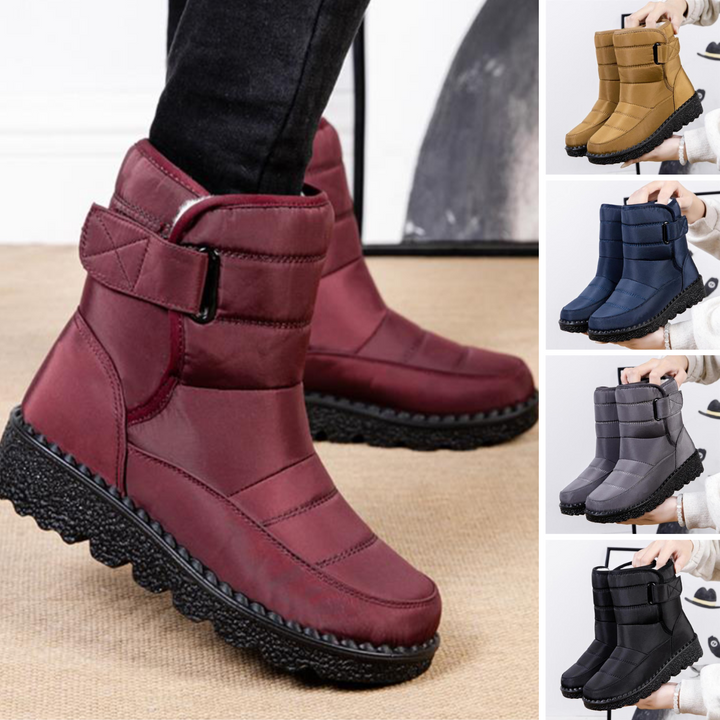 Practical women's waterproof snow boots. Warm, comfortable, and non-slip for winter safety.