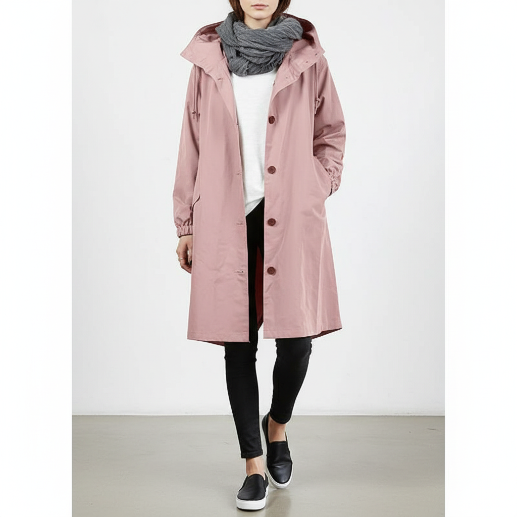 Stylish women's longline rain jacket with hood, water resistant for spring & fall outerwear.