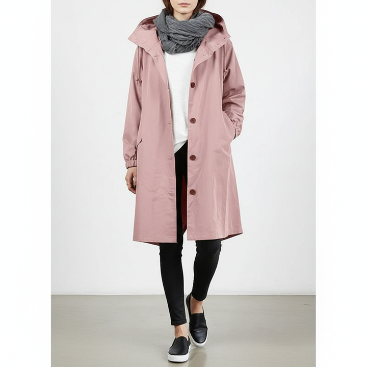 Stylish women's longline rain jacket with hood, water resistant for spring & fall outerwear.