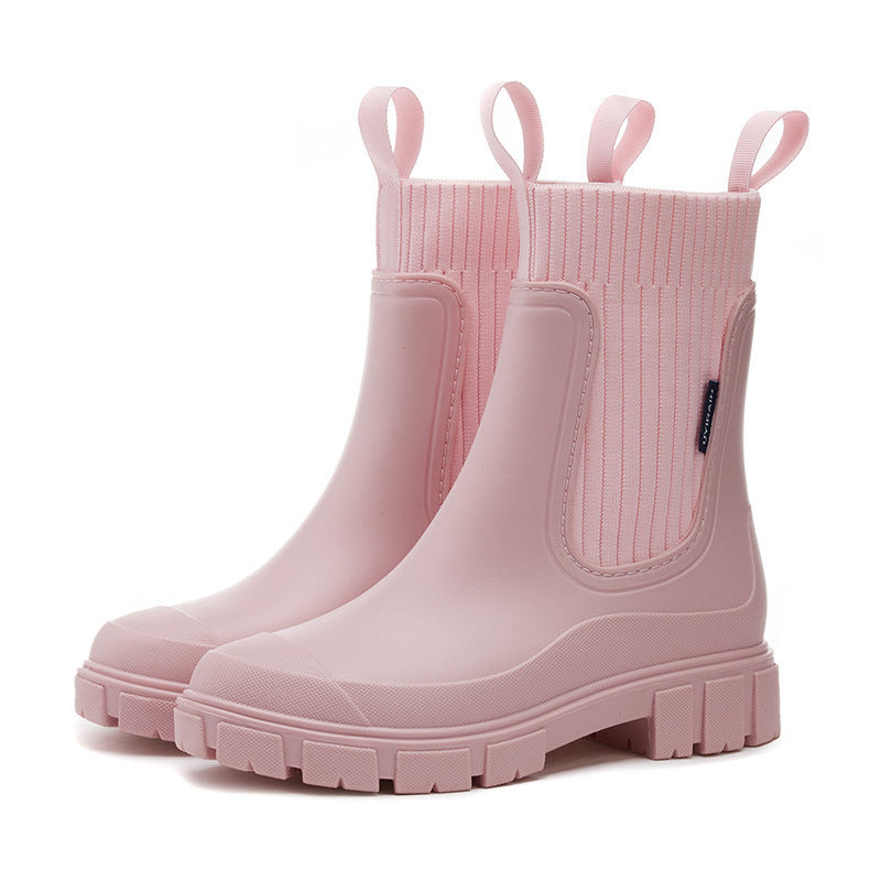 Front view of women's waterproof boots. Perfect for staying dry & stylish on rainy days, offering comfort & non-slip grip.
