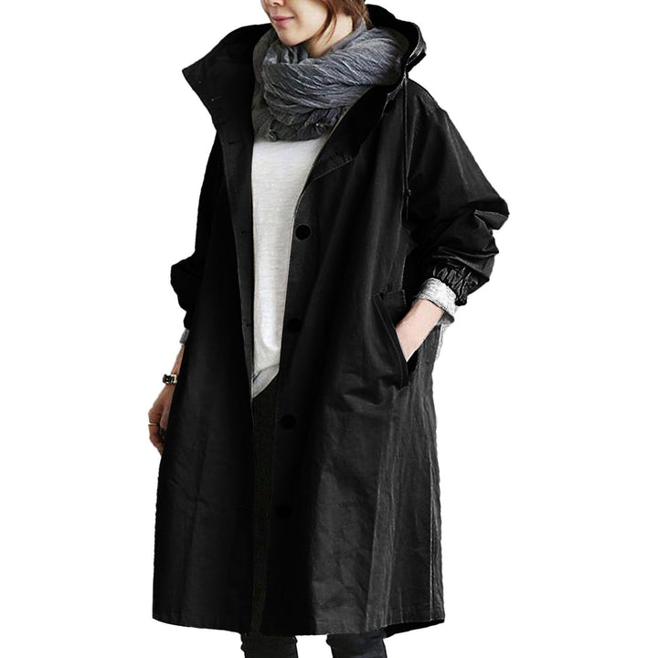 Fashionable women's long rain jacket, waterproof and windproof, ideal for casual outdoor wear.