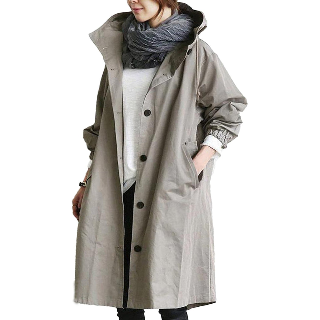 Casual ladies' long raincoat, fully waterproof for women, offering reliable weather protection and comfort.