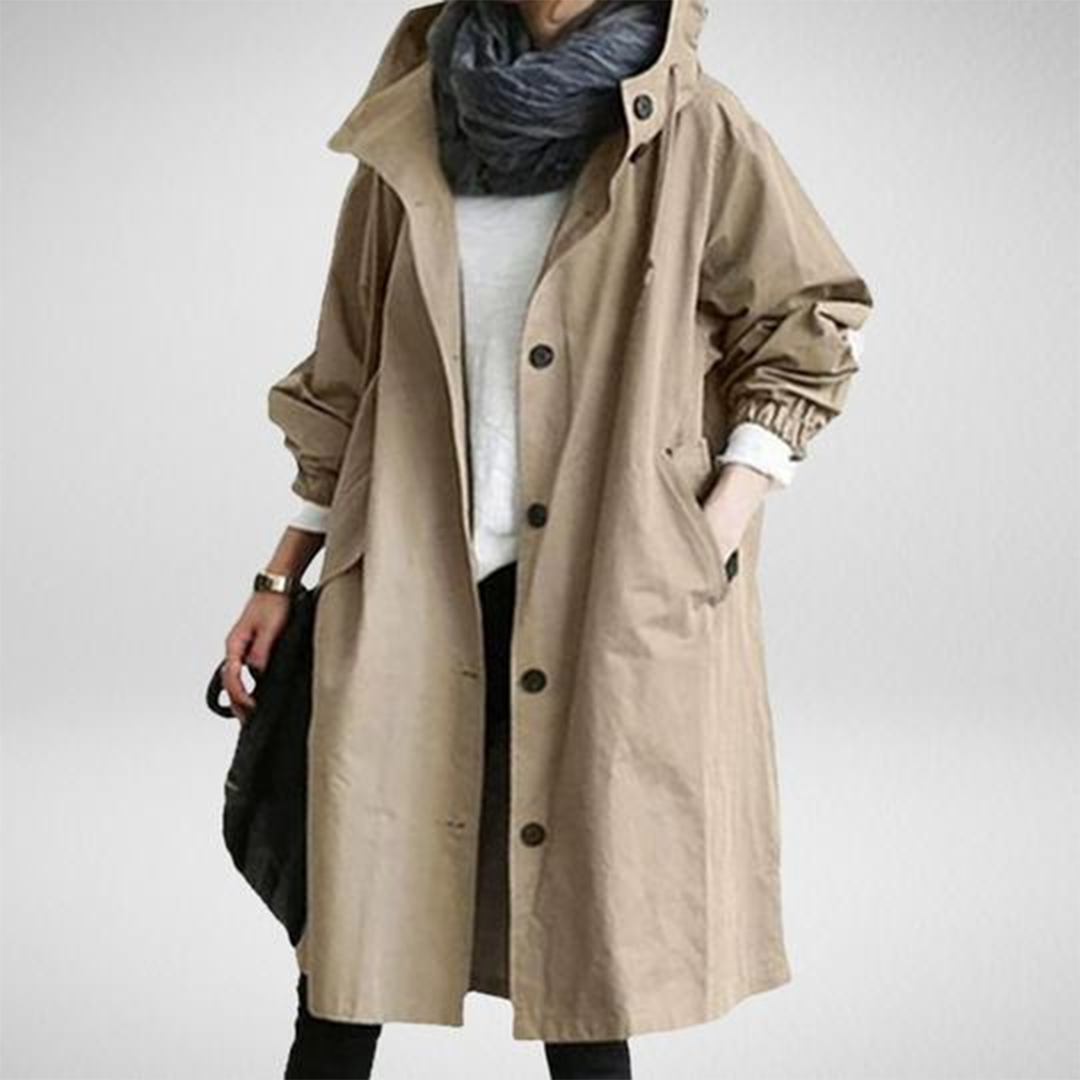 Stylish women's waterproof long jacket, perfect for urban and outdoor adventures, ensuring all-weather comfort.