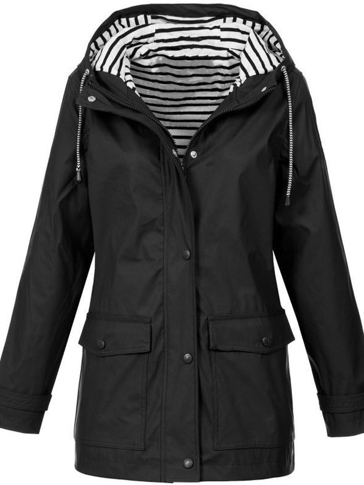Durable women's waterproof windproof rain jacket. Ideal outerwear for unpredictable fall & spring weather.