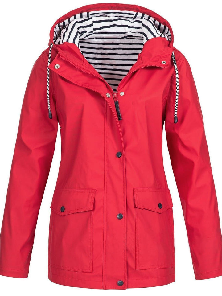 Casual women's hooded jacket, fully waterproof & windproof. Essential outerwear for fall, spring & light winter.