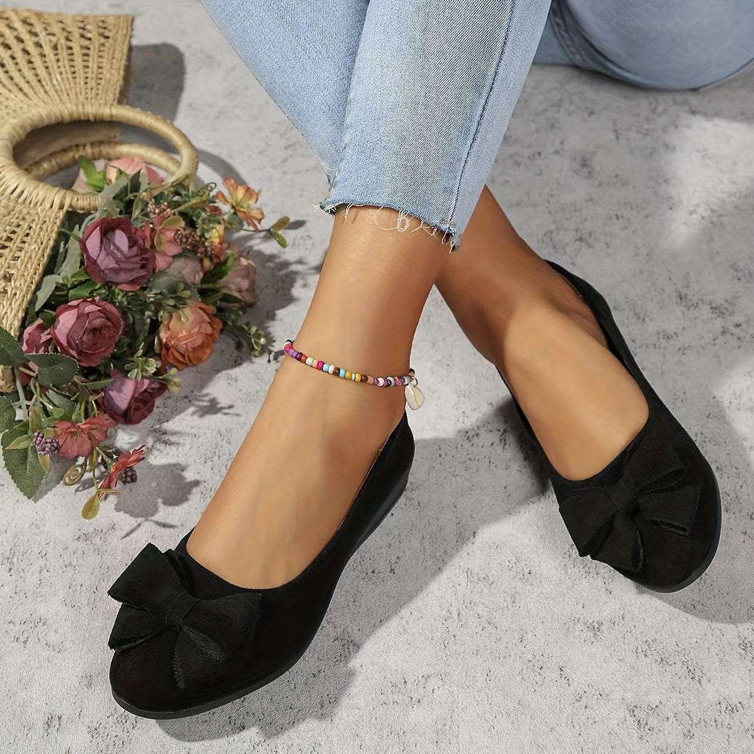Stylish slip-on wedge ballet flats for women, round toe, and an elegant bow, versatile footwear.