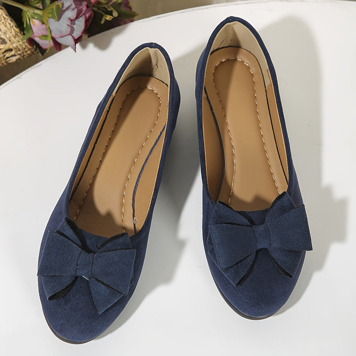 Elegant women's round toe wedge shoes, featuring a bow detail, offering comfort for all-day wear.