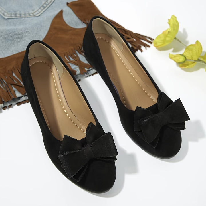 Women's stylish wedge ballet flats with a bow, round toe, and slip-on design for office comfort.