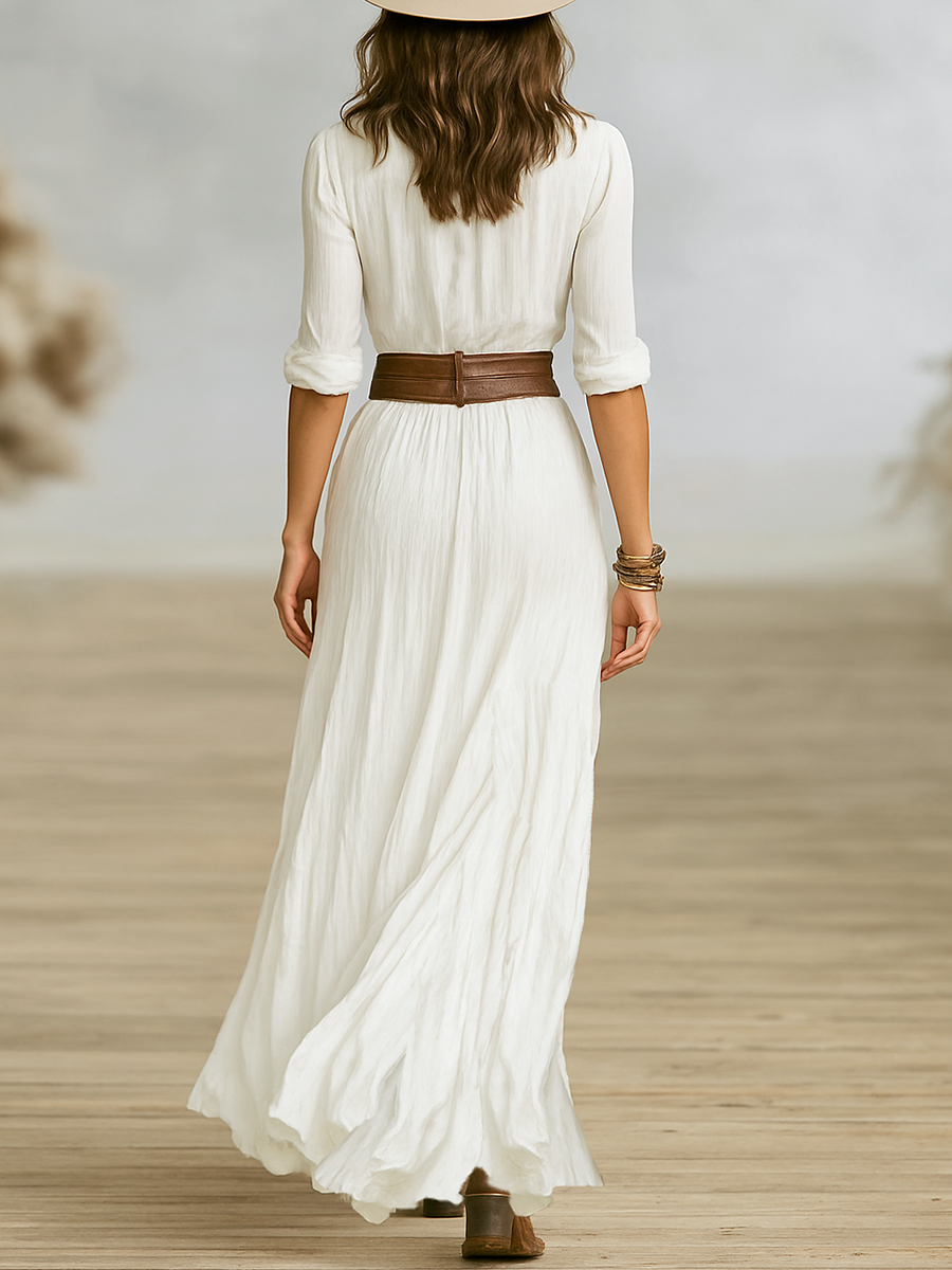 Stylish women's Western boho maxi dress, V-neck, long sleeve, high-low hem, flowing for spring/summer.