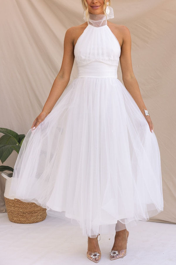 Beautiful layered tulle midi dress for women, ideal as a wedding guest, party, or evening dress.