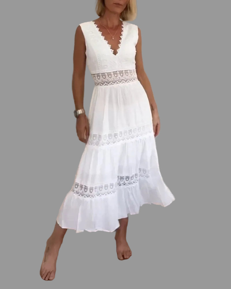 Women's white boho chic midi dress, perfect for summer, casual wear, or festivals. Relaxed fit sundress.