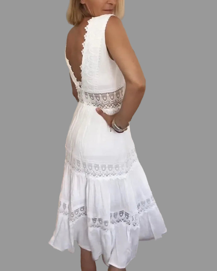 Effortless bohemian midi dress for women, a chic white sundress with a relaxed fit for summer and casual style.