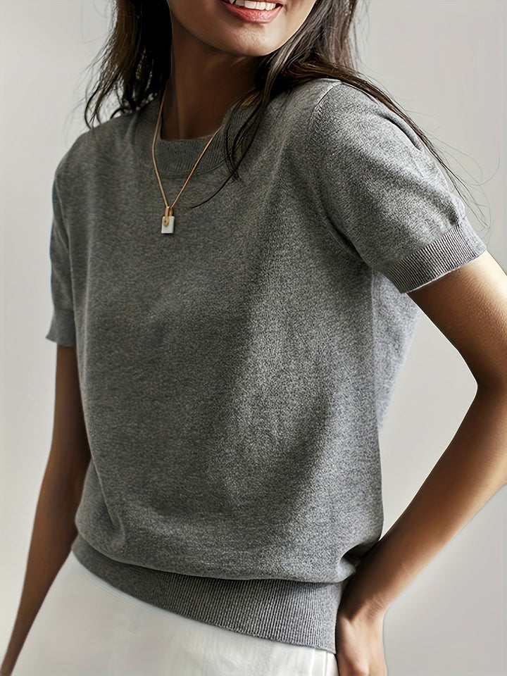 Women's white crew neck ribbed short sleeve tee, a comfortable everyday essential top.