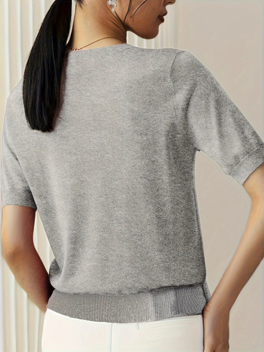 Light grey women's soft ribbed short sleeve top, a cozy crew neck tee for relaxed days.
