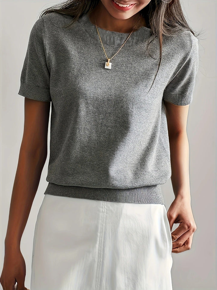 Black women's crew neck ribbed short sleeve top, versatile for casual spring outfits.