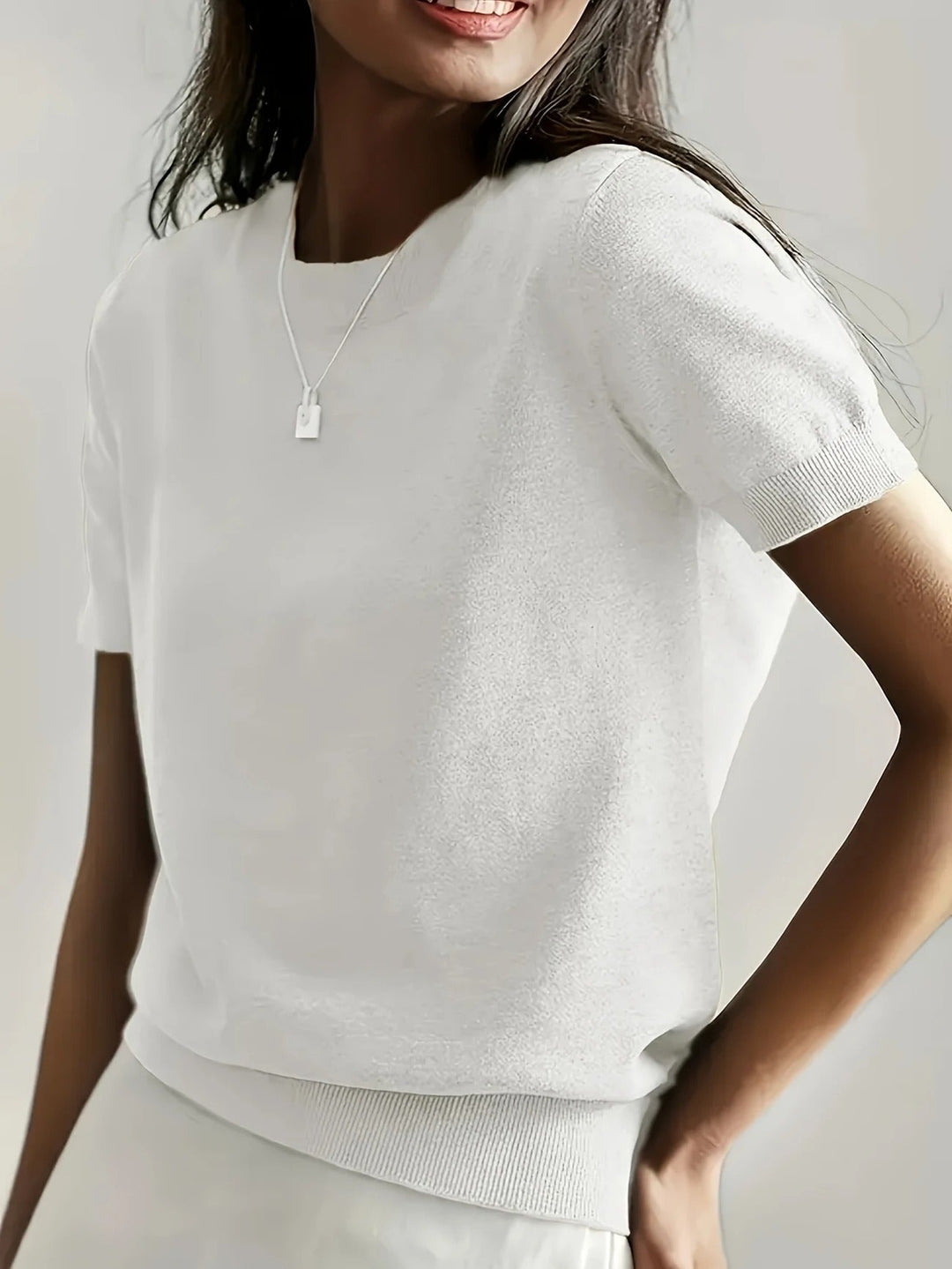 Everyday women's grey ribbed short sleeve top, a classic crew neck tee for ultimate comfort.