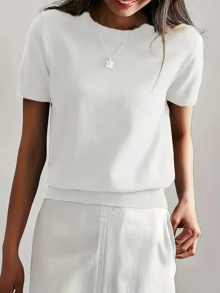 Versatile women's beige ribbed short sleeve tee, crew neck top for various casual outfits.