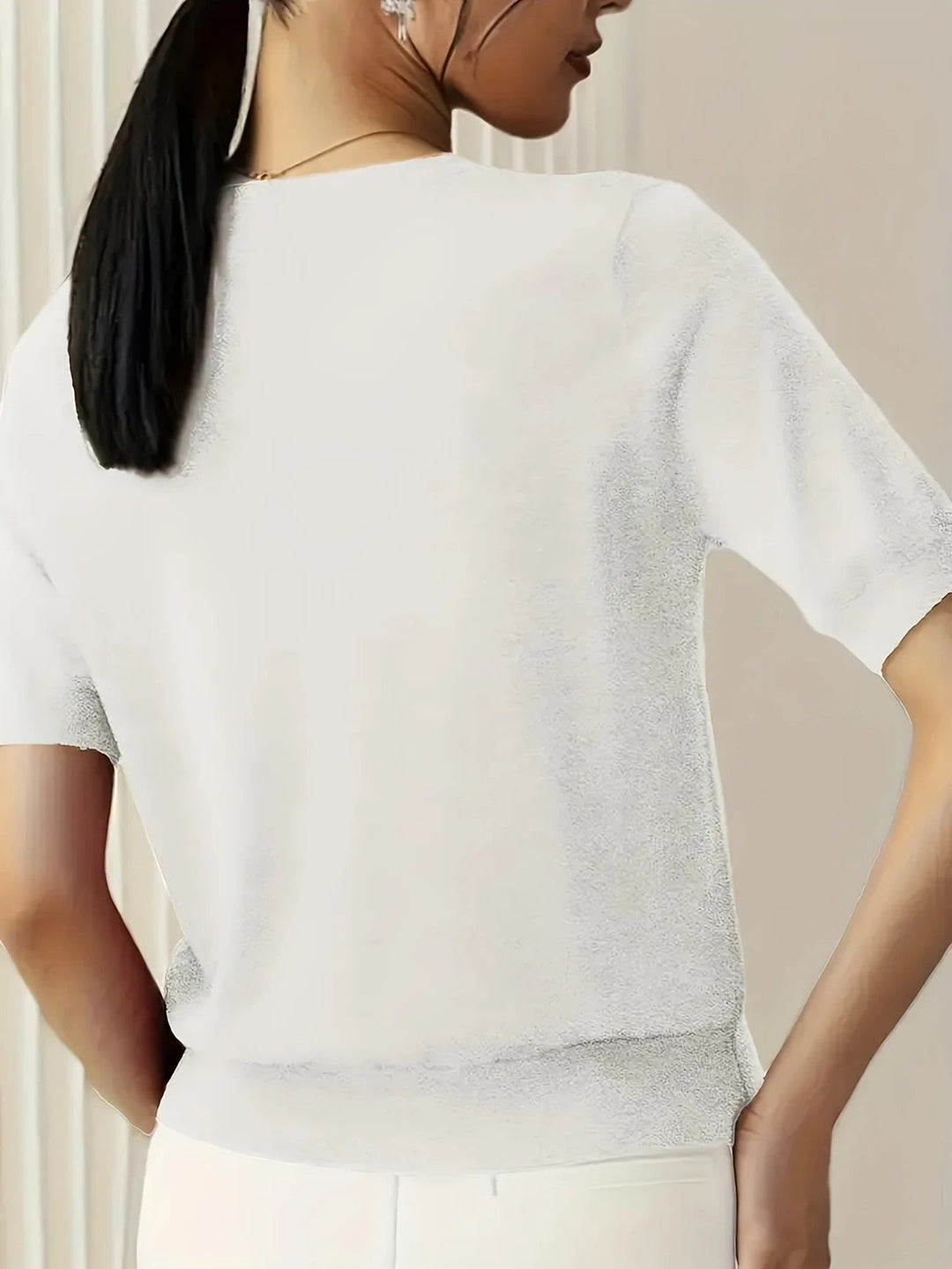 Essential women's green crew neck ribbed short sleeve top, comfortable and casually chic.