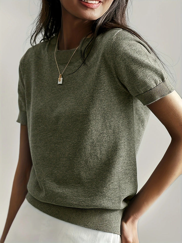 Soft pink women's short sleeve ribbed top, crew neck design, perfect for spring-summer.