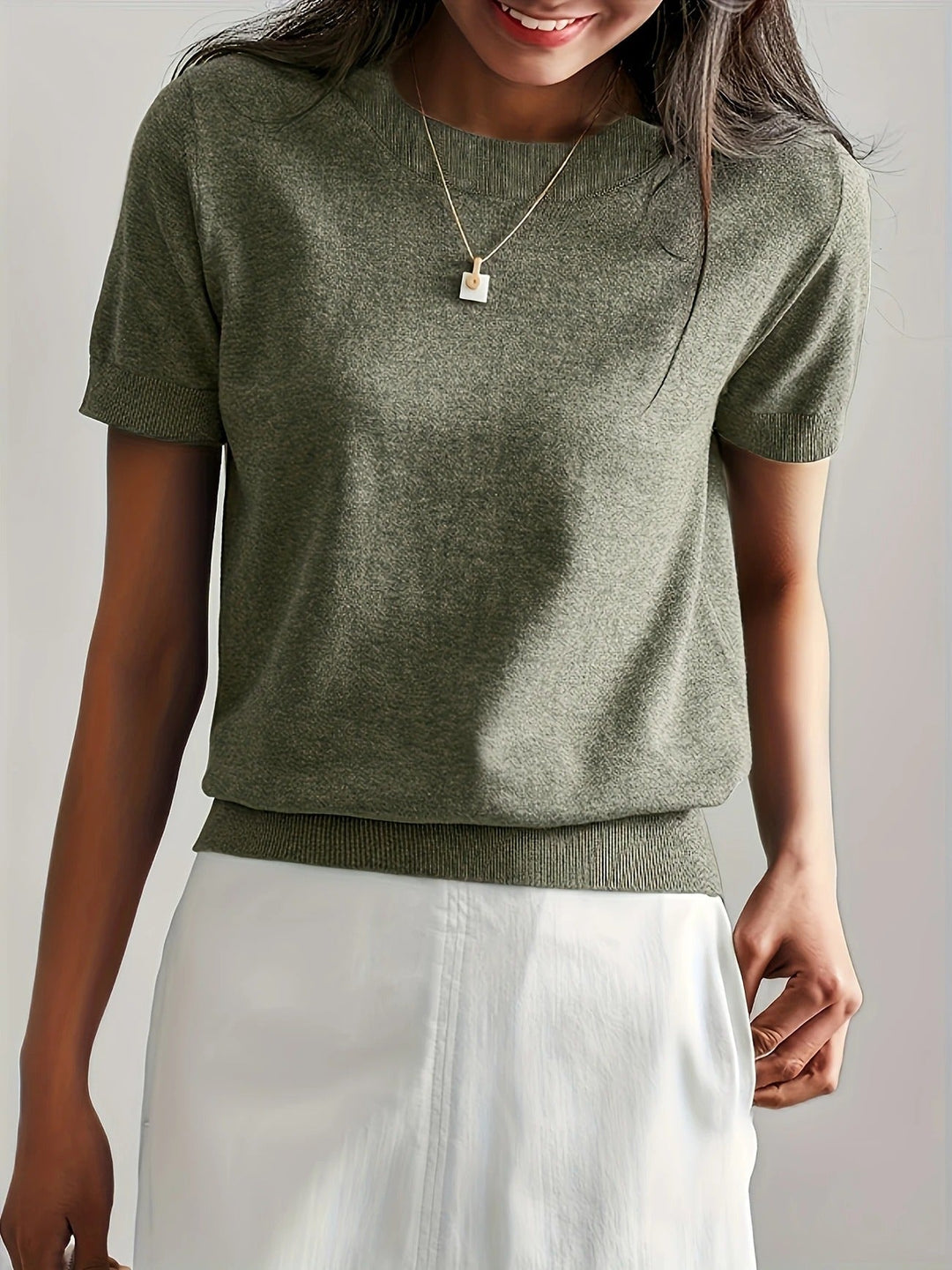Grey women's crew neck ribbed short sleeve tee, a versatile & comfortable everyday top.
