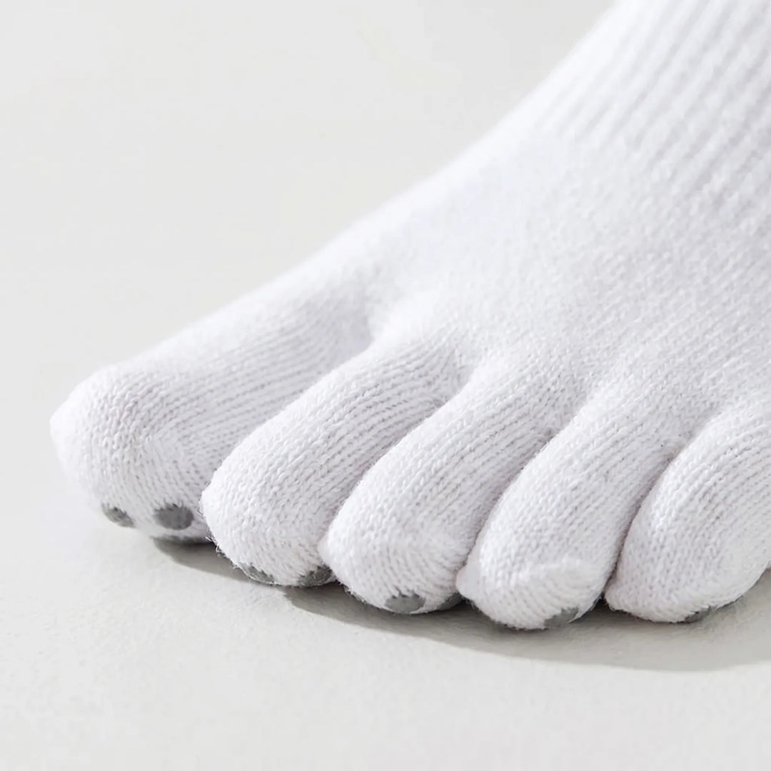Women's athletic five-toe grip socks in white, designed for enhanced balance and stability in yoga & pilates.