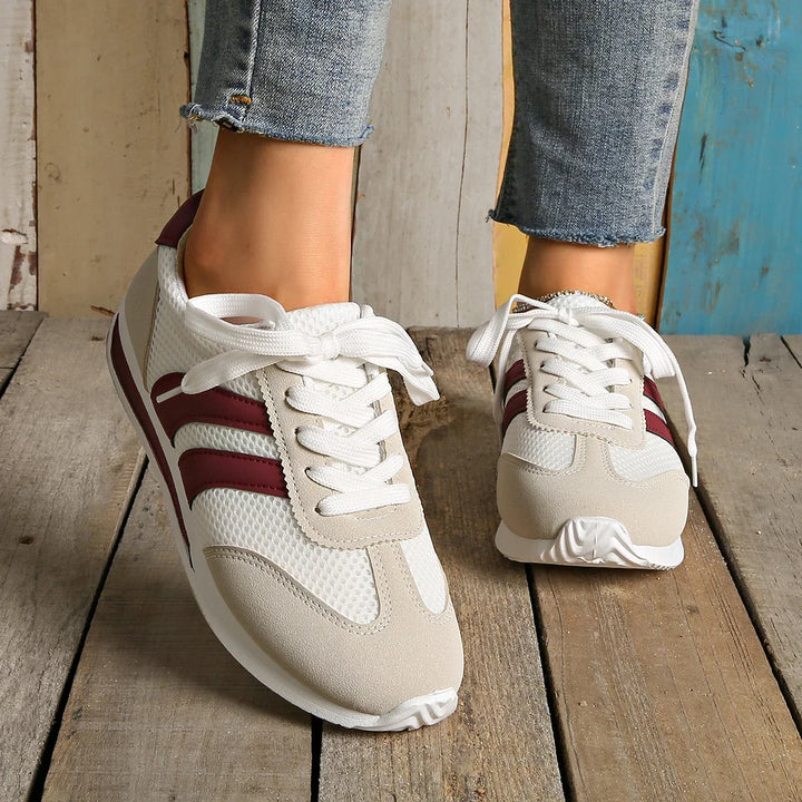 Comfortable women's low-top lace-up walking sneakers for all-day wear and everyday style.