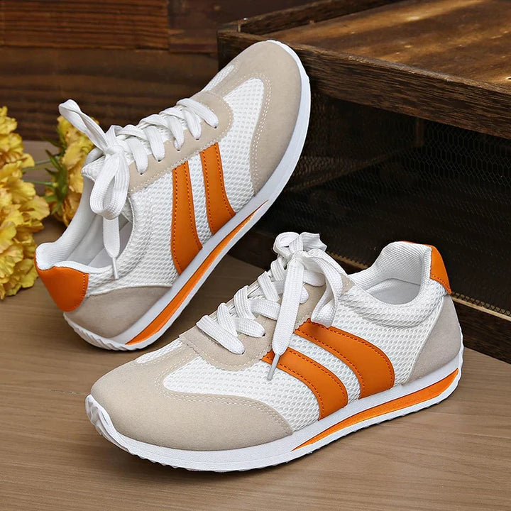 Women's lace-up low-top sneakers. Stylish, comfortable everyday footwear for casual walking.
