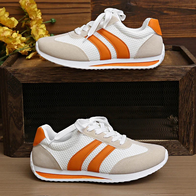 Chic women's low-top lace-up sneakers, perfect comfortable walking shoes for everyday style.