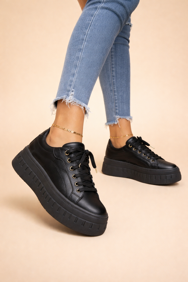 Comfortable women's lace-up platform sneakers featuring a supportive cushioned sole for all-day wear.