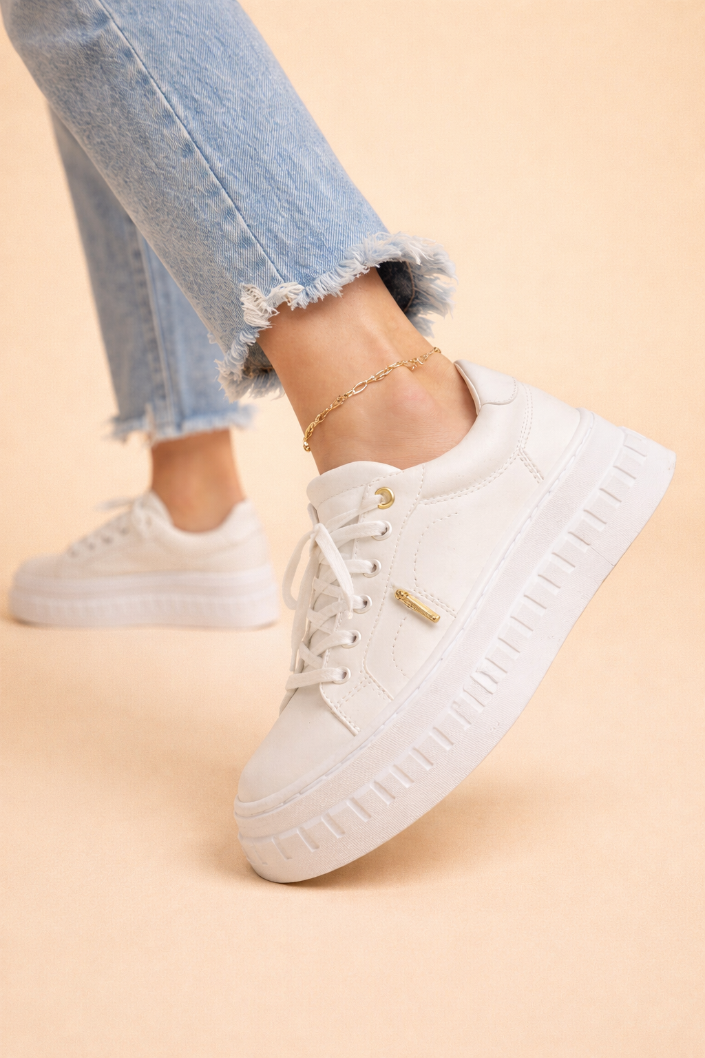 Fashionable women's platform trainers with a padded collar and cushioned sole for maximum comfort.