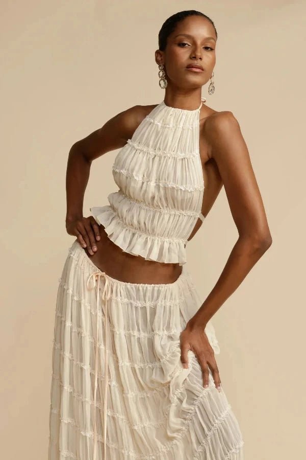 Close-up of white bliss printed fabric on a women's lounge two-piece matching set. Soft and trendy.