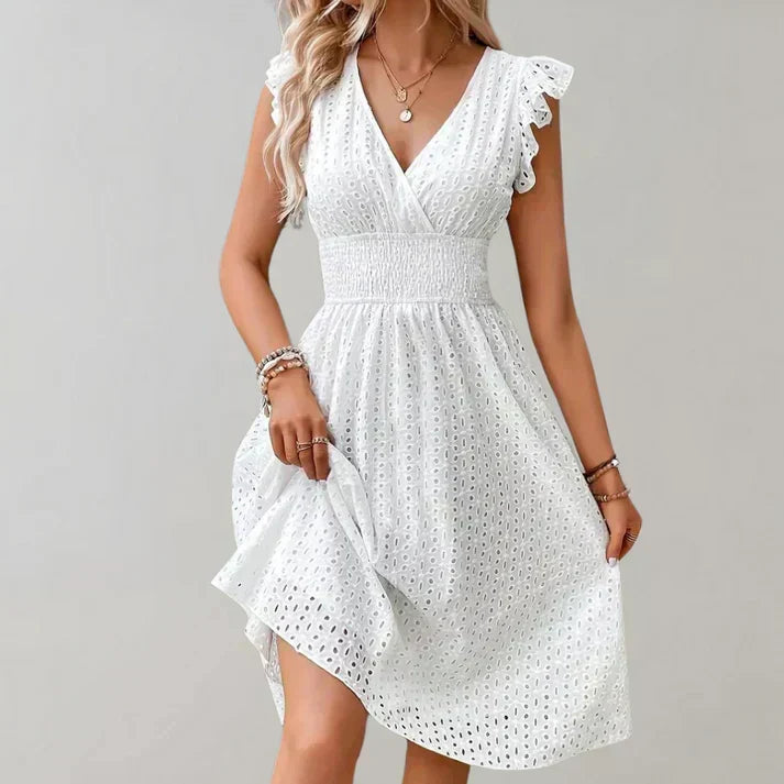Flowy white women's V-neck midi dress featuring chic ruffled sleeves and a comfortable, casual design for everyday.
