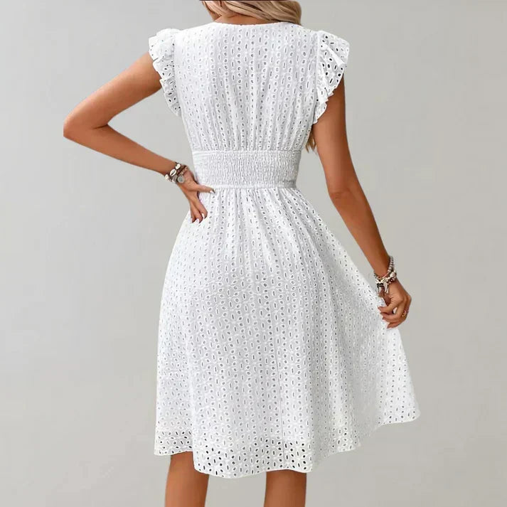 Stylish women's white V-neck midi dress, featuring charming ruffled sleeves & a flattering flared silhouette.