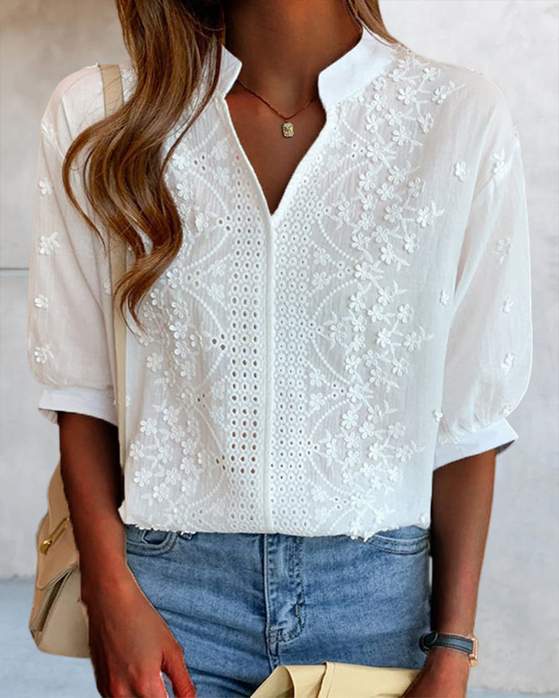 Chic women's V-neck patchwork blouse, featuring elegant puff sleeves.
