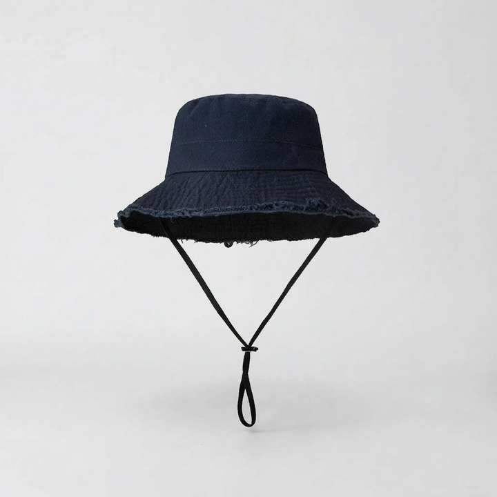 Comfortable women's wide brim bucket hat, packable design with chin strap for ultimate sun protection.