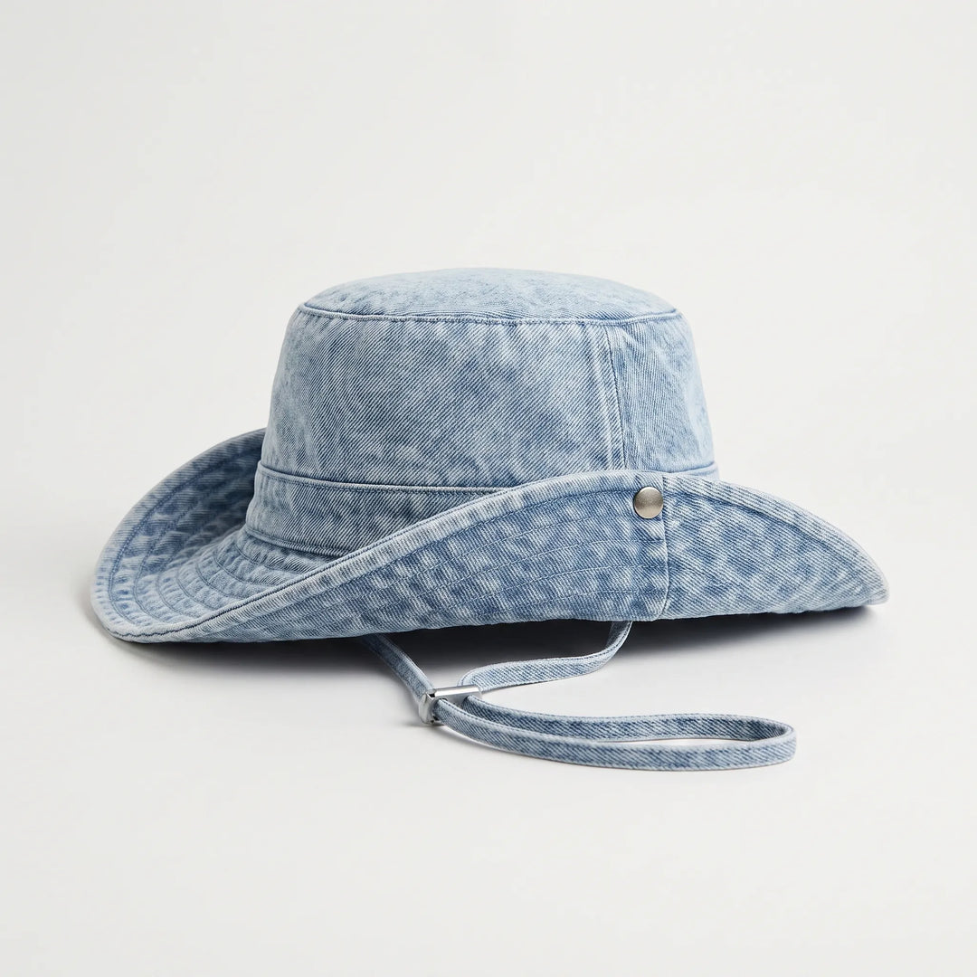 Chic women's wide brim sun bucket hat, an essential summer accessory for beach, pool, or garden shade.
