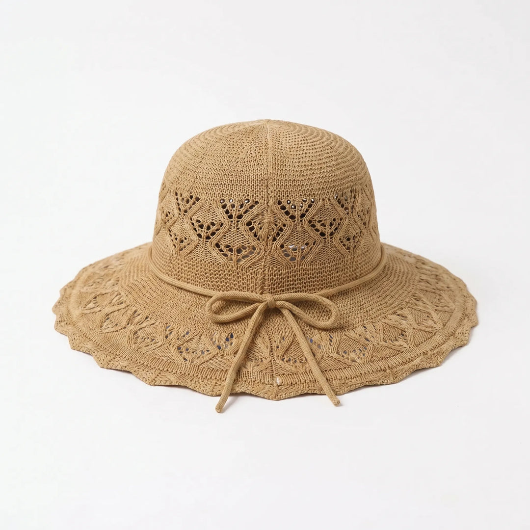 Versatile women's wide brim sun hat, foldable for travel, ideal for beach, garden, & outdoor sun protection.