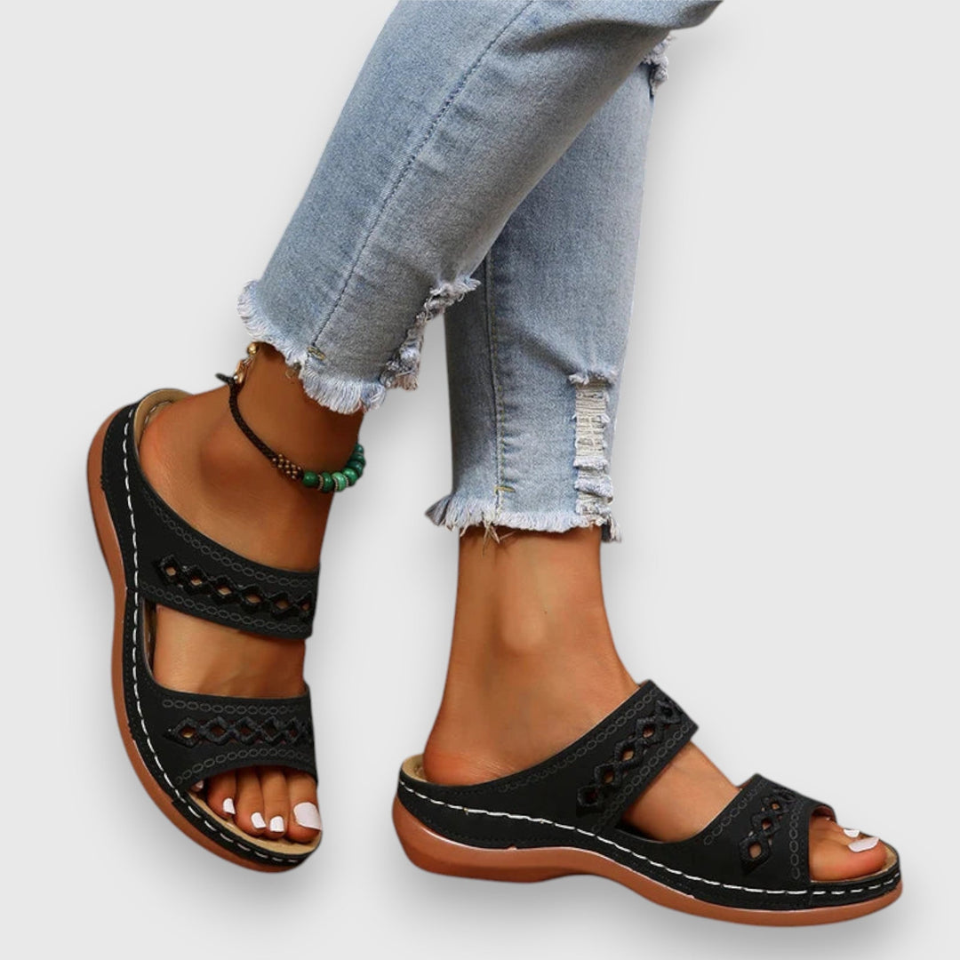 Slip-on wide fit comfort sandals for ladies, designed for easy daily wear.