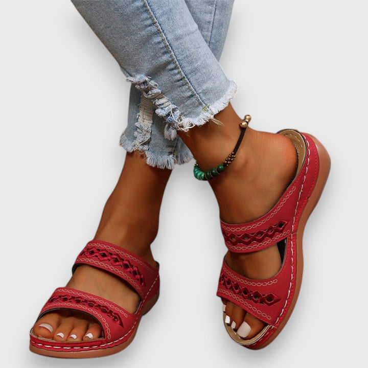 Fashionable wide fit flat sandals for women, ensuring all-day comfort and versatility.
