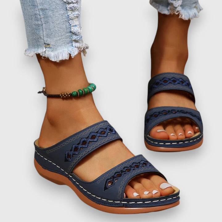 Slip-on ergonomic wide fit sandals for women, offering ultimate comfort and support.