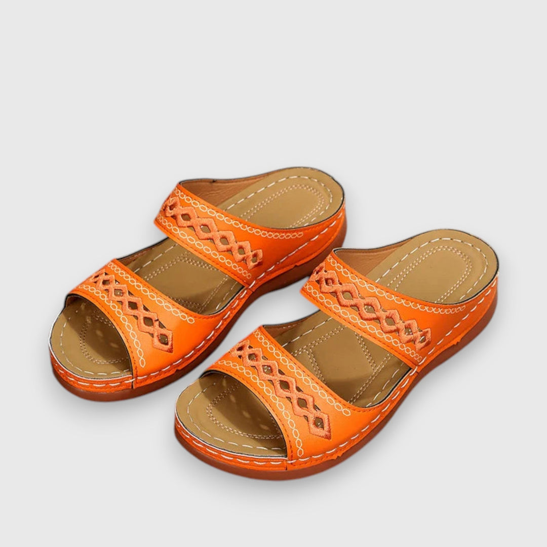 Versatile women's comfort sandals with wide fit design for all-day wear.