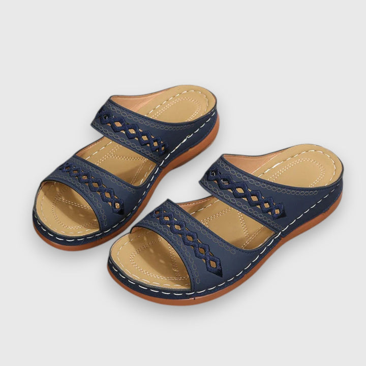 Stylish flat wide fit sandals for women, great for casual summer fashion.