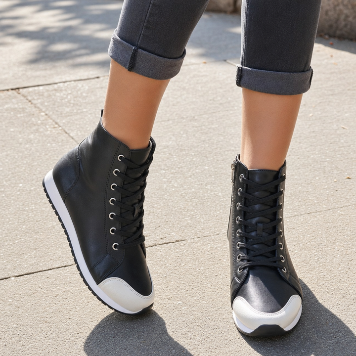 Comfortable women's wide-fit orthopedic sneakers with lace-up design for ultimate foot support.