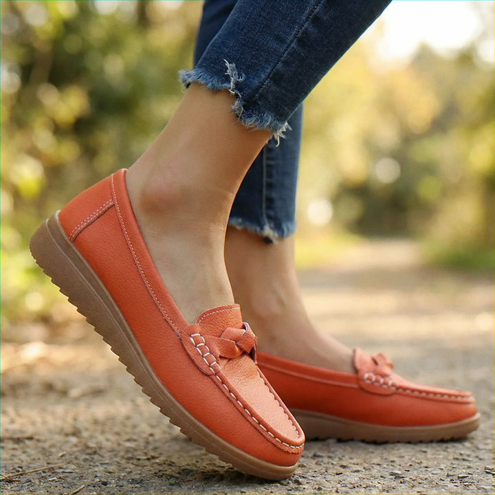 Orthopedic women's loafers in grey, wide fit, offering superior arch support and cushioning.
