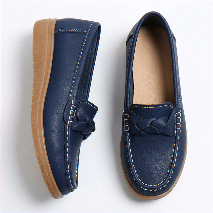 Navy women's orthopedic slip-on loafers, wide fit, offering excellent arch support.