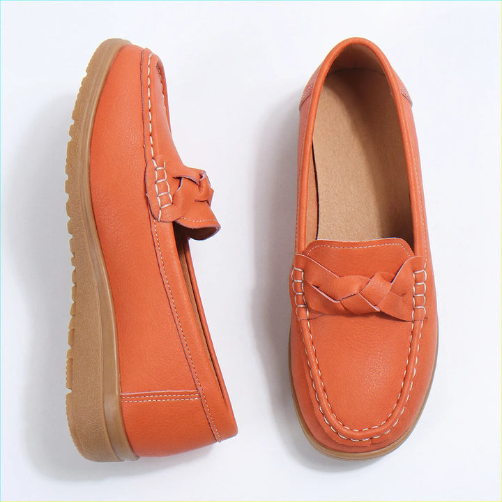Front view of women's wide fit orthopedic loafers, showcasing effective arch support.