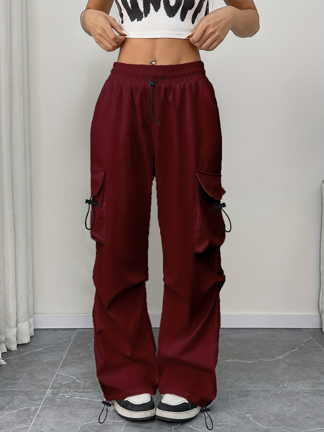 Stylish women's wide leg cargo pants with drawstring waist, perfect for everyday casual comfort.