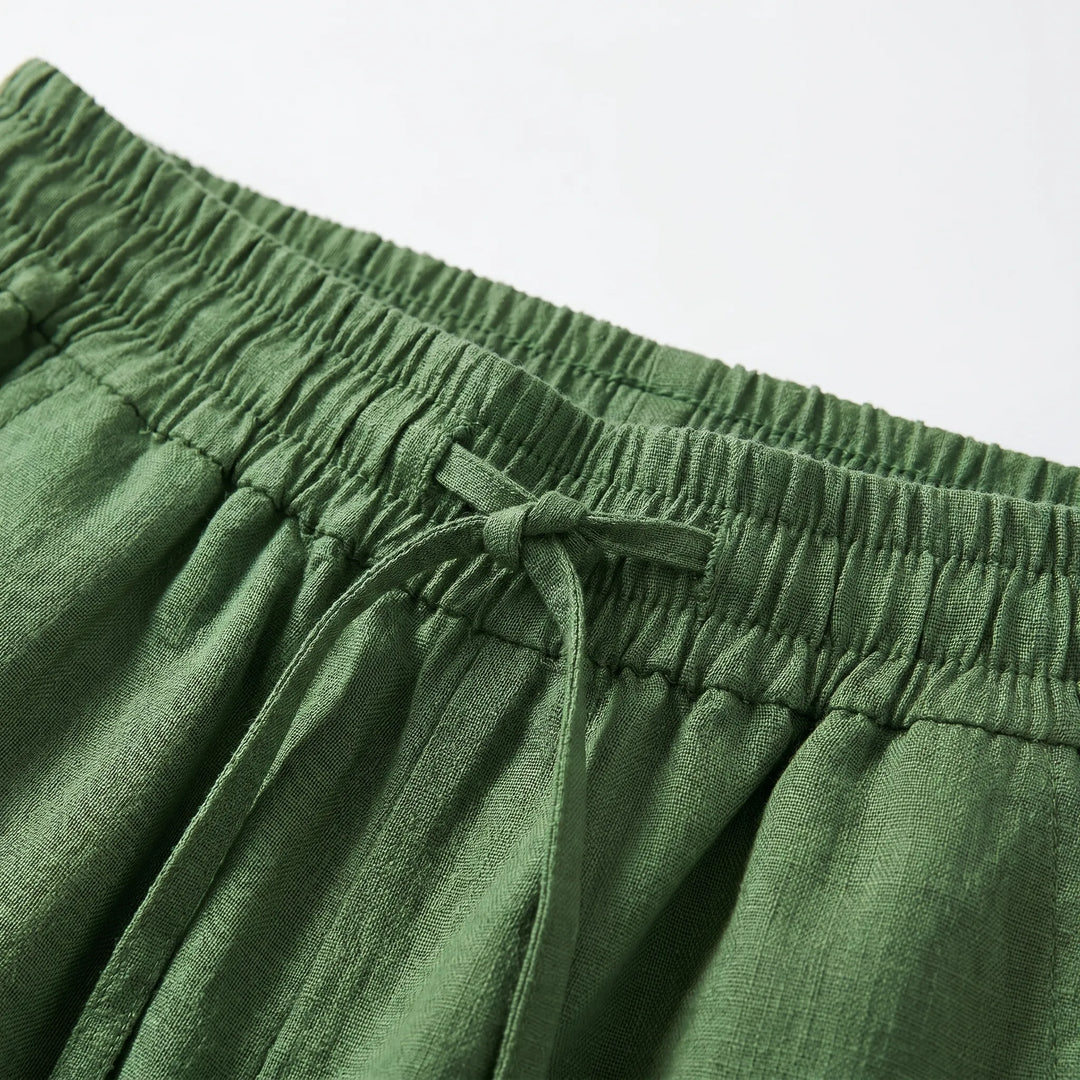 Mid-rise women's wide-leg casual pants. Relaxed fit pull-on trousers for versatile, comfortable everyday wear.