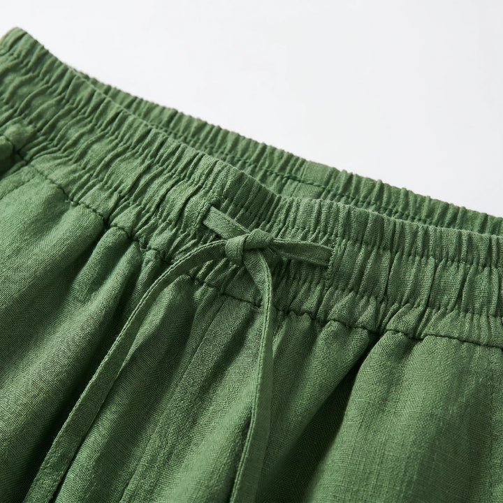 Mid-rise women's wide-leg casual pants. Relaxed fit pull-on trousers for versatile, comfortable everyday wear.