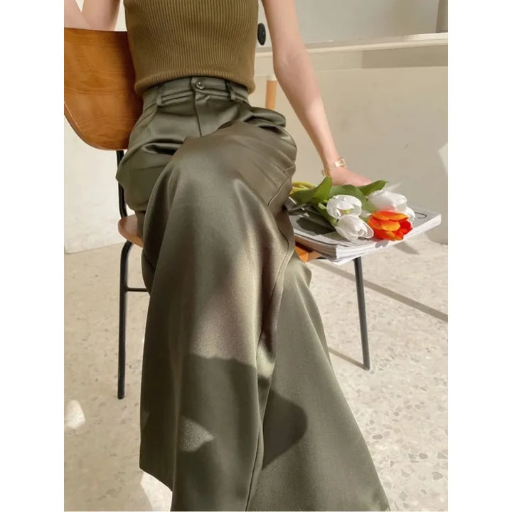 Women's wide leg high waist pants in a loose fit, offering comfortable, casual style.
